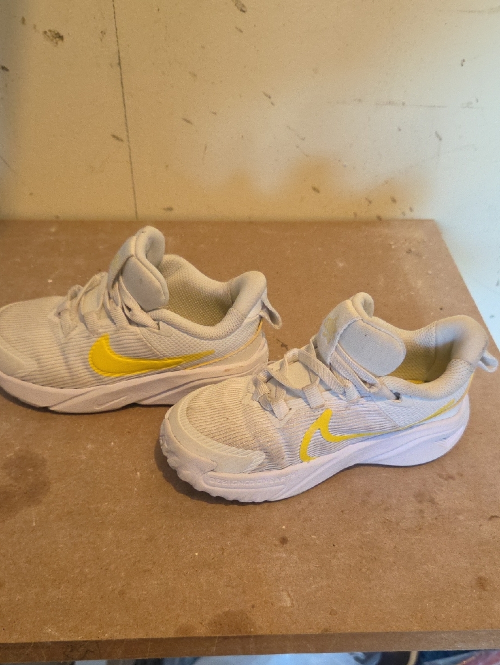 Nike Kids Sneakers in White with Yellow Swoosh